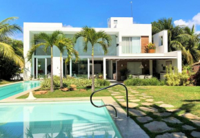 Casa de Praia em Interlagos - 4 suítes a poucos metros do mar
